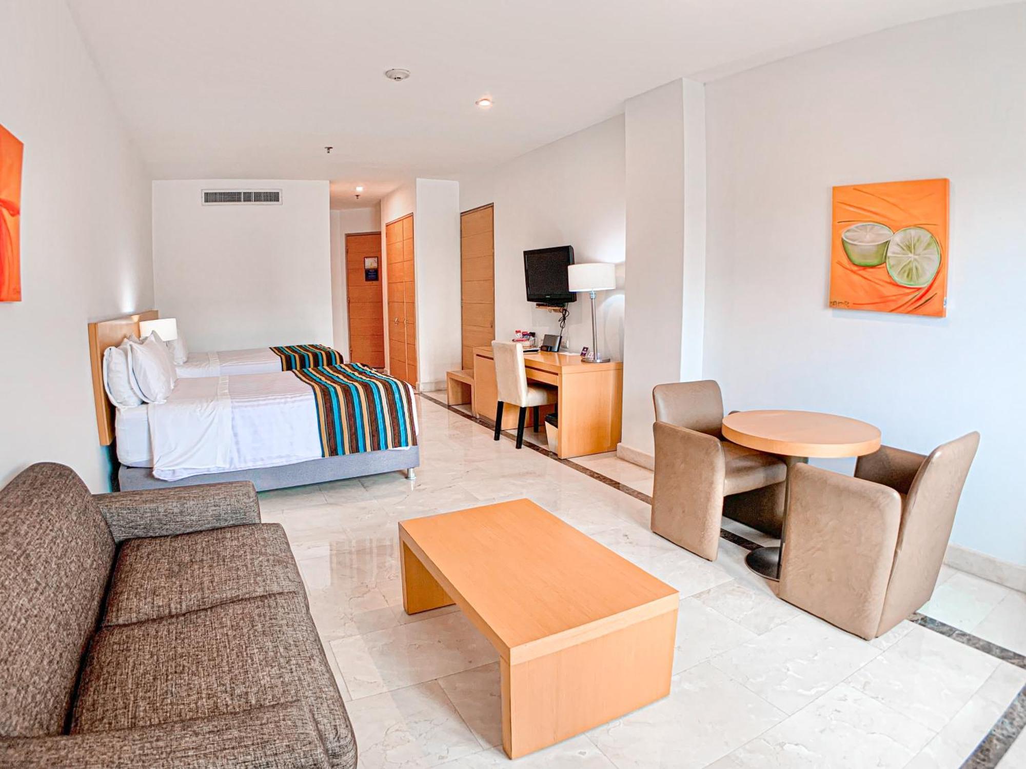 Hotel Dann Carlton Barranquilla Y Centro De Convenciones Экстерьер фото A room at the hotel